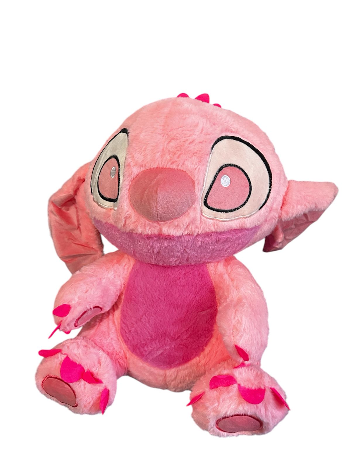 peluche con manta stitch rosa