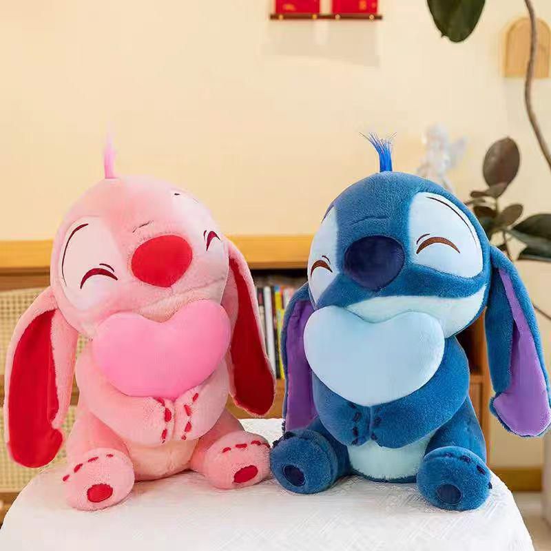 peluche stitch con manta corazon 35cm